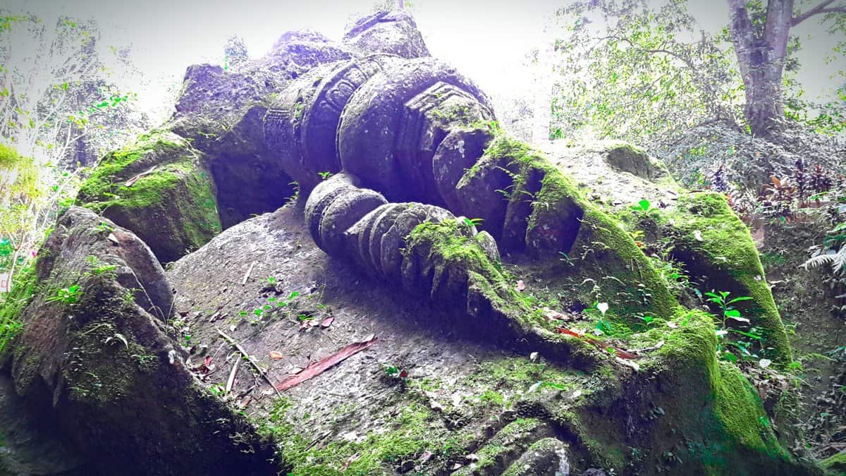 fallen statue at goa gajah