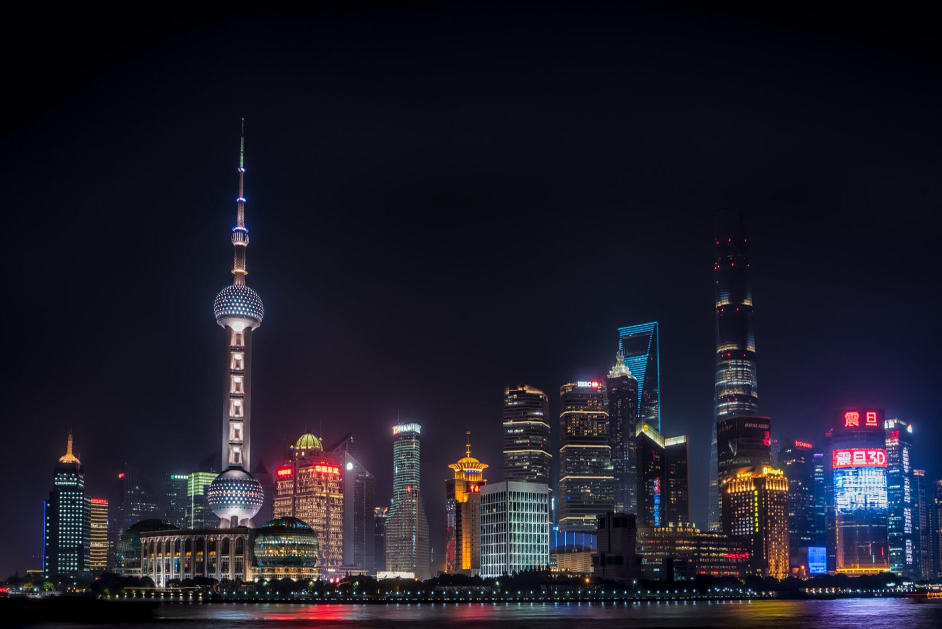 Night view of the Shanghai skyline along the Huangpu River, China.