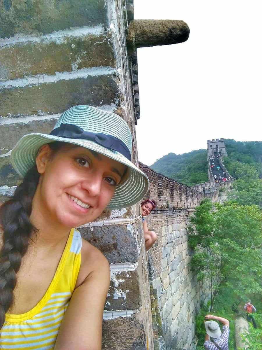 peaking out from the watchtower at Mutianyu Great Wall, - China Things to do