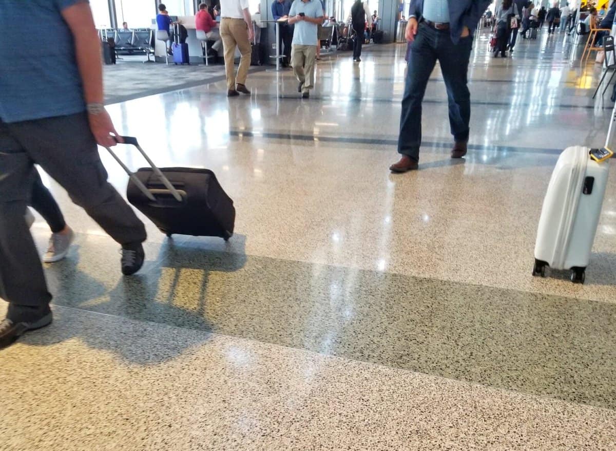 lightweight backpack with wheels - roll in airport