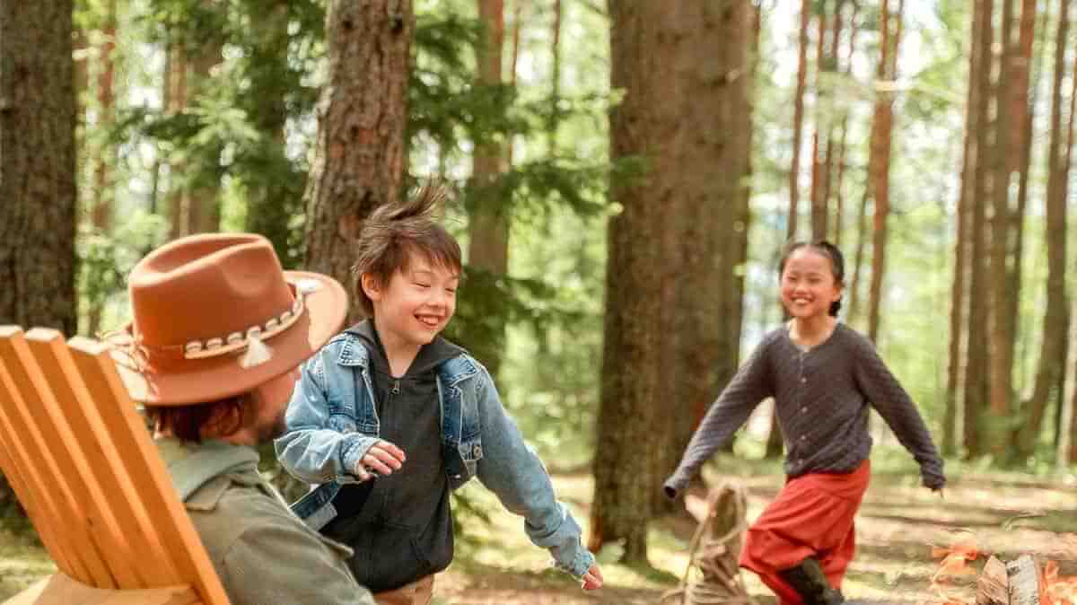kids running in woods