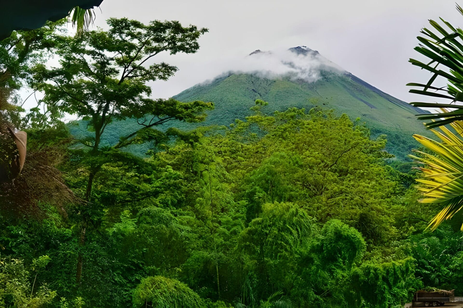 Arenal Volcano in La Fortuna, Costa Rica - 14 days View of Arenal Volcano surrounded by lush greenery in La Fortuna, Costa Rica.