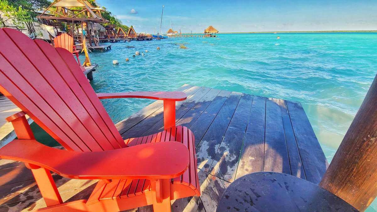 Bacalar pier seating vs Holbox beaches