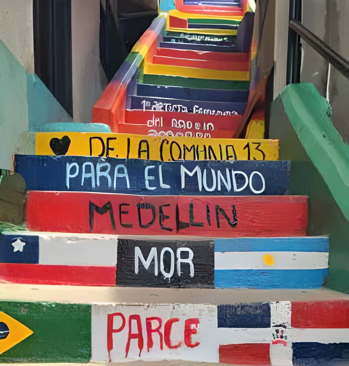 Colorful painted stairs with various messages in Comuna 13, Medellin, Colombia.