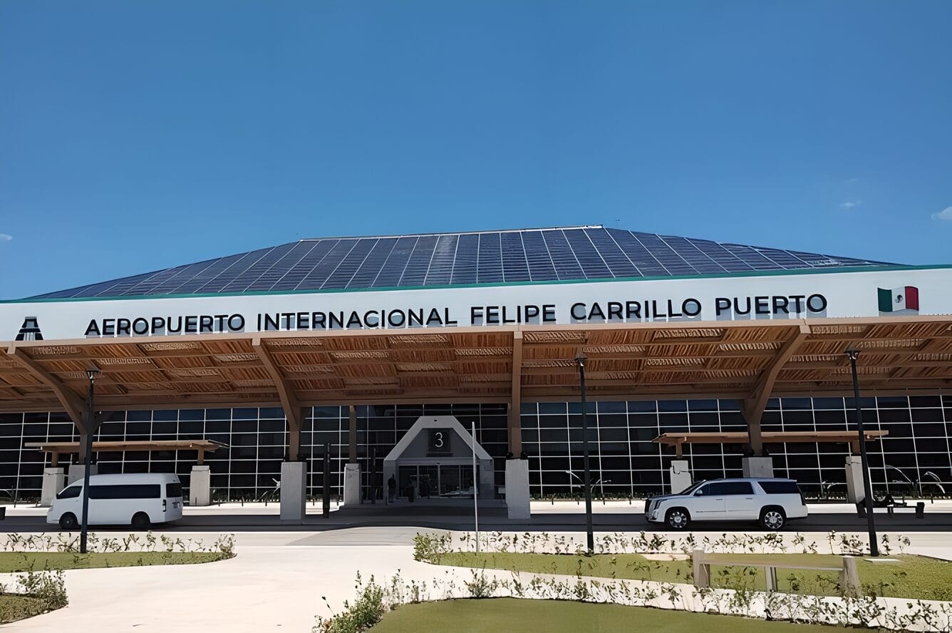 Aeropuerto Internacional Felipe Carrillo Puerto in Tulum, Mexico with a clear blue sky in the background.